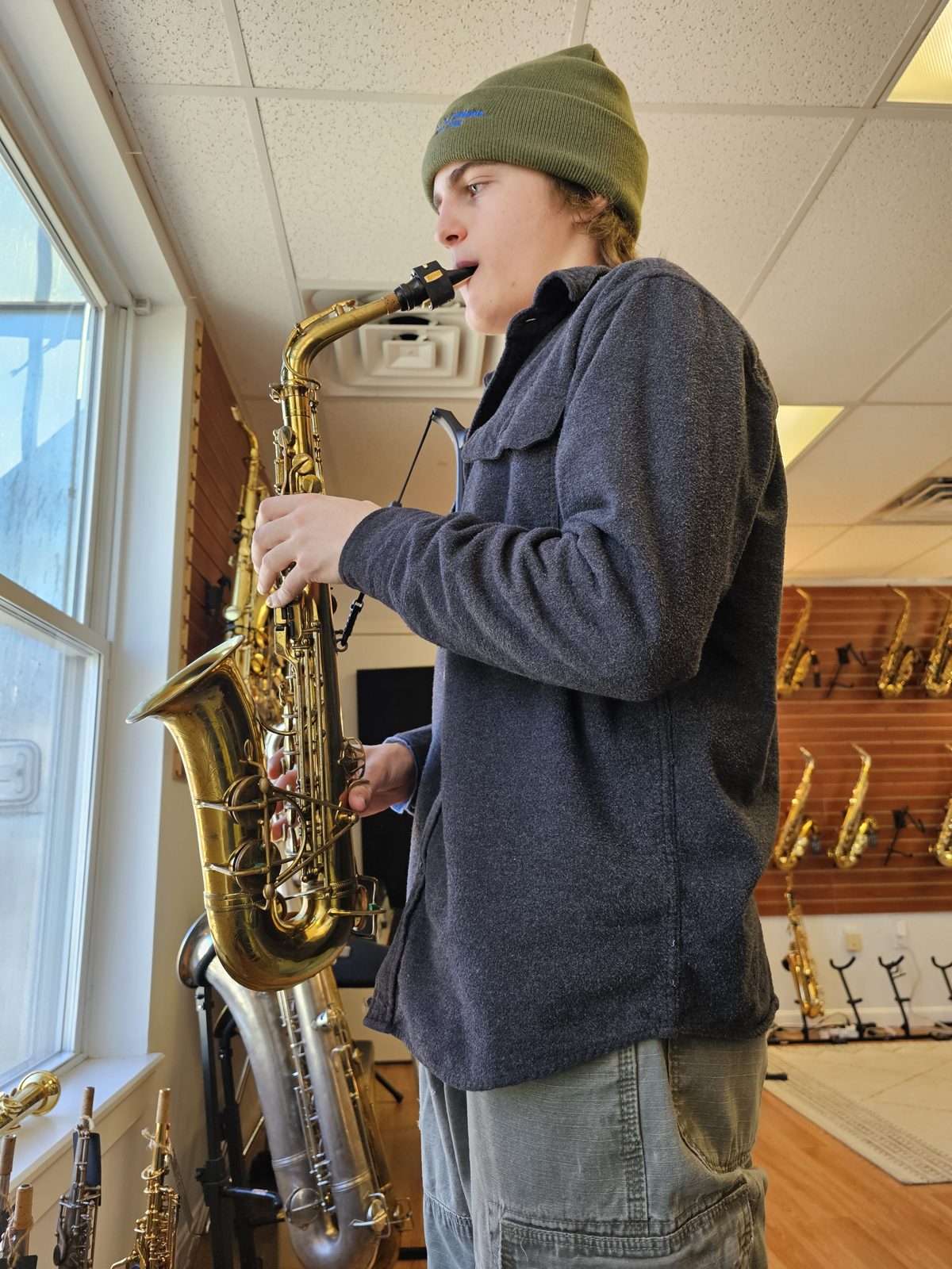 August Hickey playing tenor saxophone